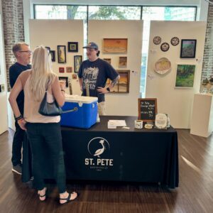 St. Pete Brewing Co. doing a craft beer tasting at the Juror's Reception for 99 Bottles at Florida CraftArt